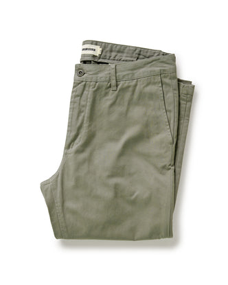 folded flatlay of The Slim Foundation Pant in Organic Smoked Olive