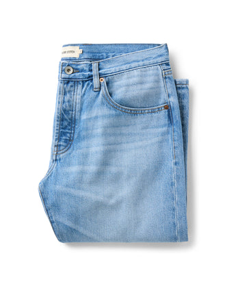 folded flatlay of The Democratic Jean in Light Wash Hemp Denim