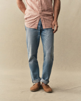 fit model showing off The Democratic Jean in Light Wash Hemp Denim