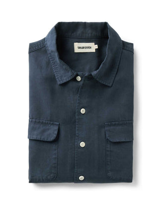 folded flatlay of The Shore Shirt in Navy Tencel