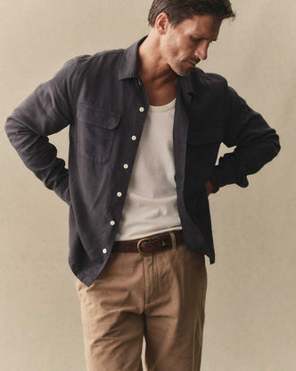 fit model posing in The Shore Shirt in Navy Tencel