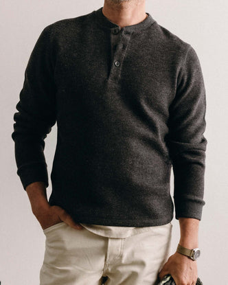 fit model posing in The Evans Henley in Charcoal Birdseye Wool