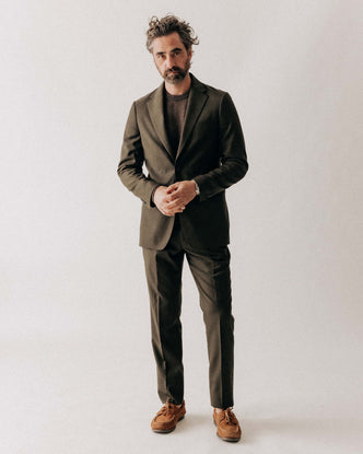 fit model posing in The Stevens Sportcoat in Black Olive Wool Flannel