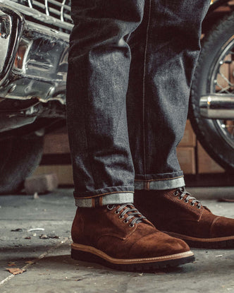 fit model showing off the side of The Moto Boot in Snuff Weatherproof Suede