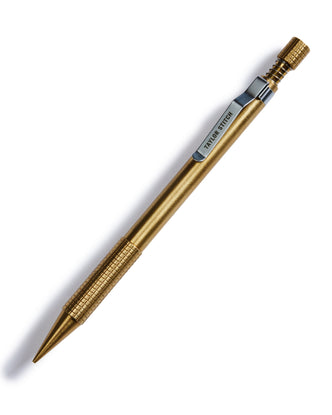 flatlay of The Mechanical Pencil in Brass