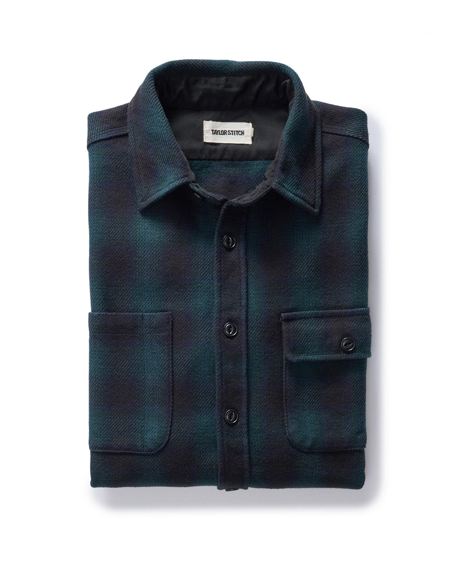 folded flatlay of The Moto Utility Shirt in Black Pine Plaid, Wovens by Taylor Stitch