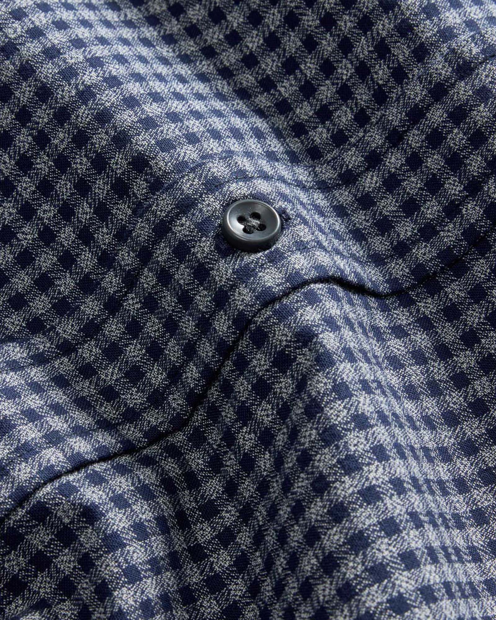 material shot of the buttons on The Jack in Marine Check, Wovens by Taylor Stitch