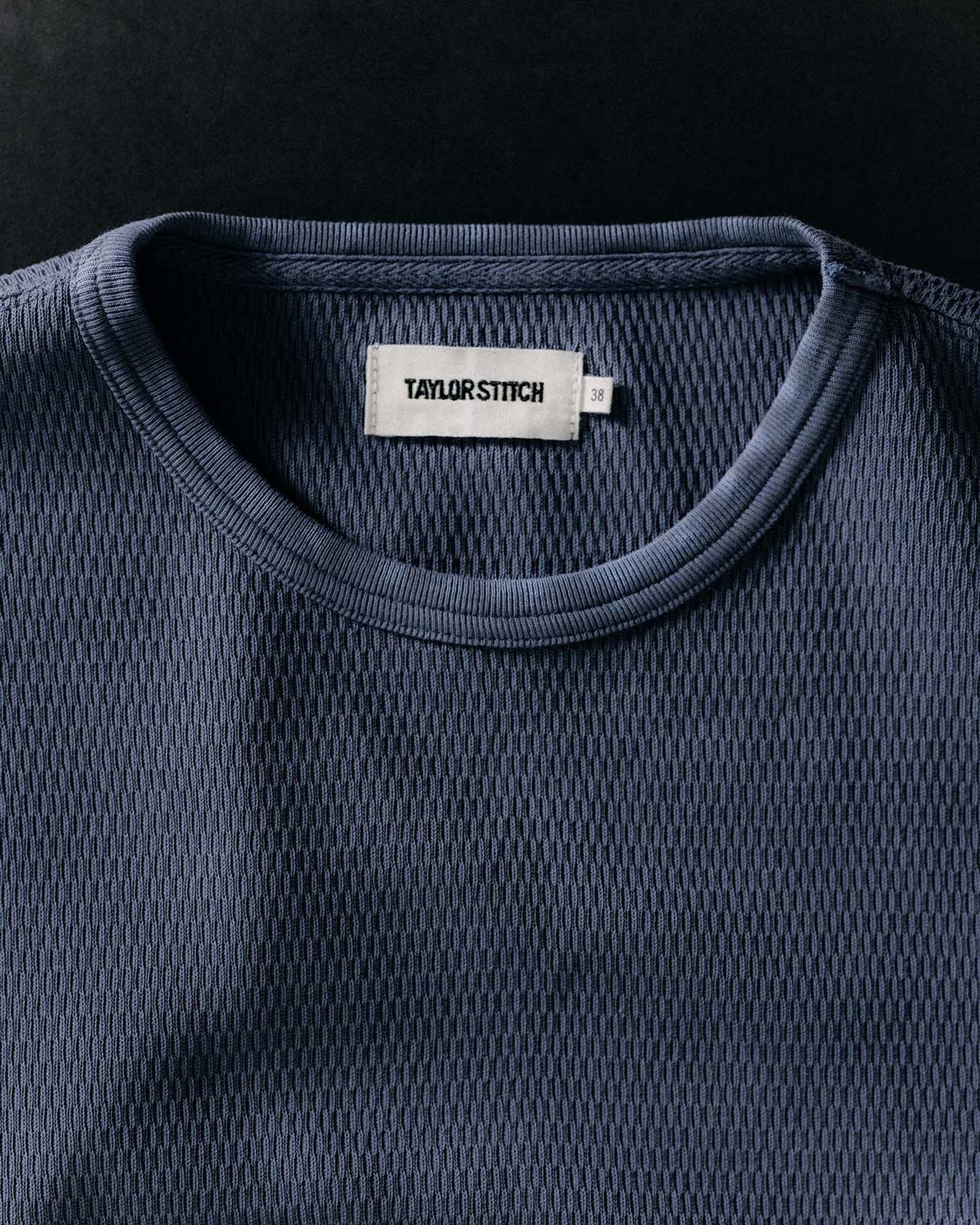 editorial image of the collar on The Organic Cotton Crew in Washed Blue Waffle, Knits by Taylor Stitch