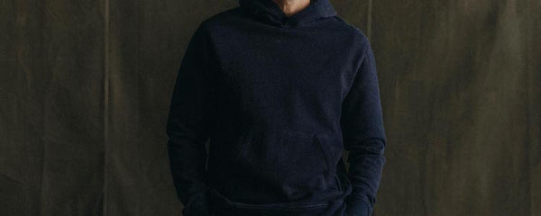 Model wearing The Sunset Hoodie in Rinsed Indigo Terry