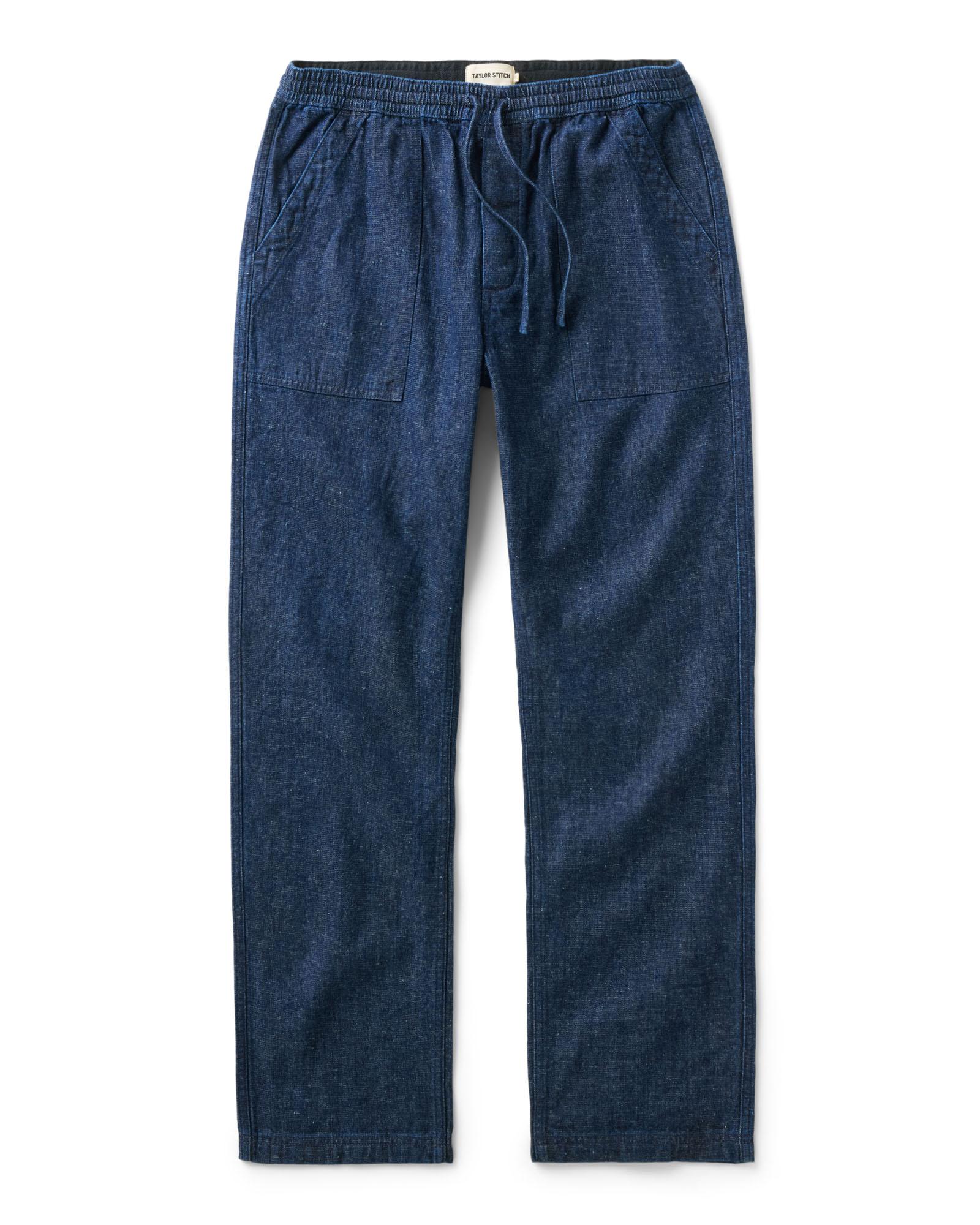 flatlay of The Breakwater Pant in Rinsed Indigo Hemp Denim, Bottoms by Taylor Stitch