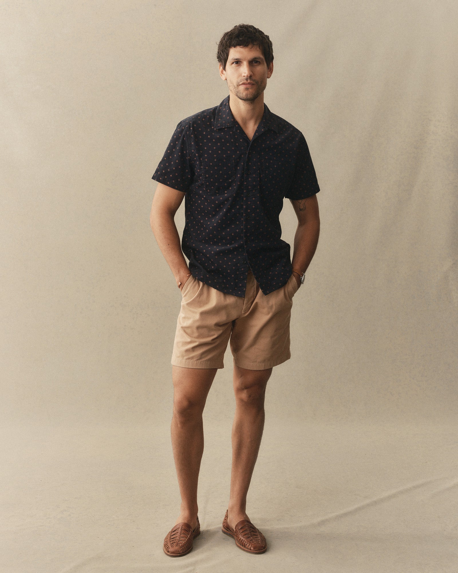 fit model posing in The Conrad Shirt in Navy Pigeon Foulard Pincord, Wovens by Taylor Stitch