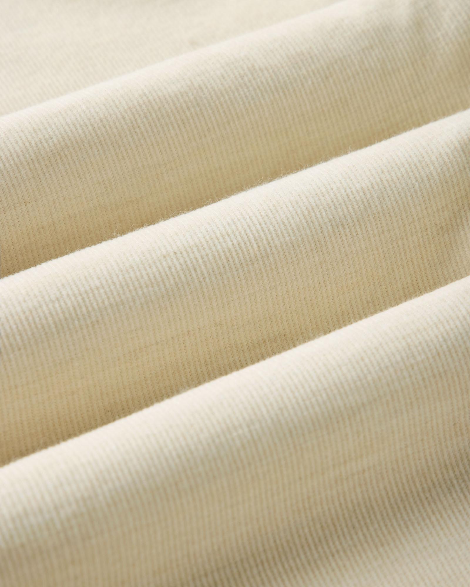 material shot of the fabric on The Conrad Shirt in Heather Oat Pincord, Wovens by Taylor Stitch