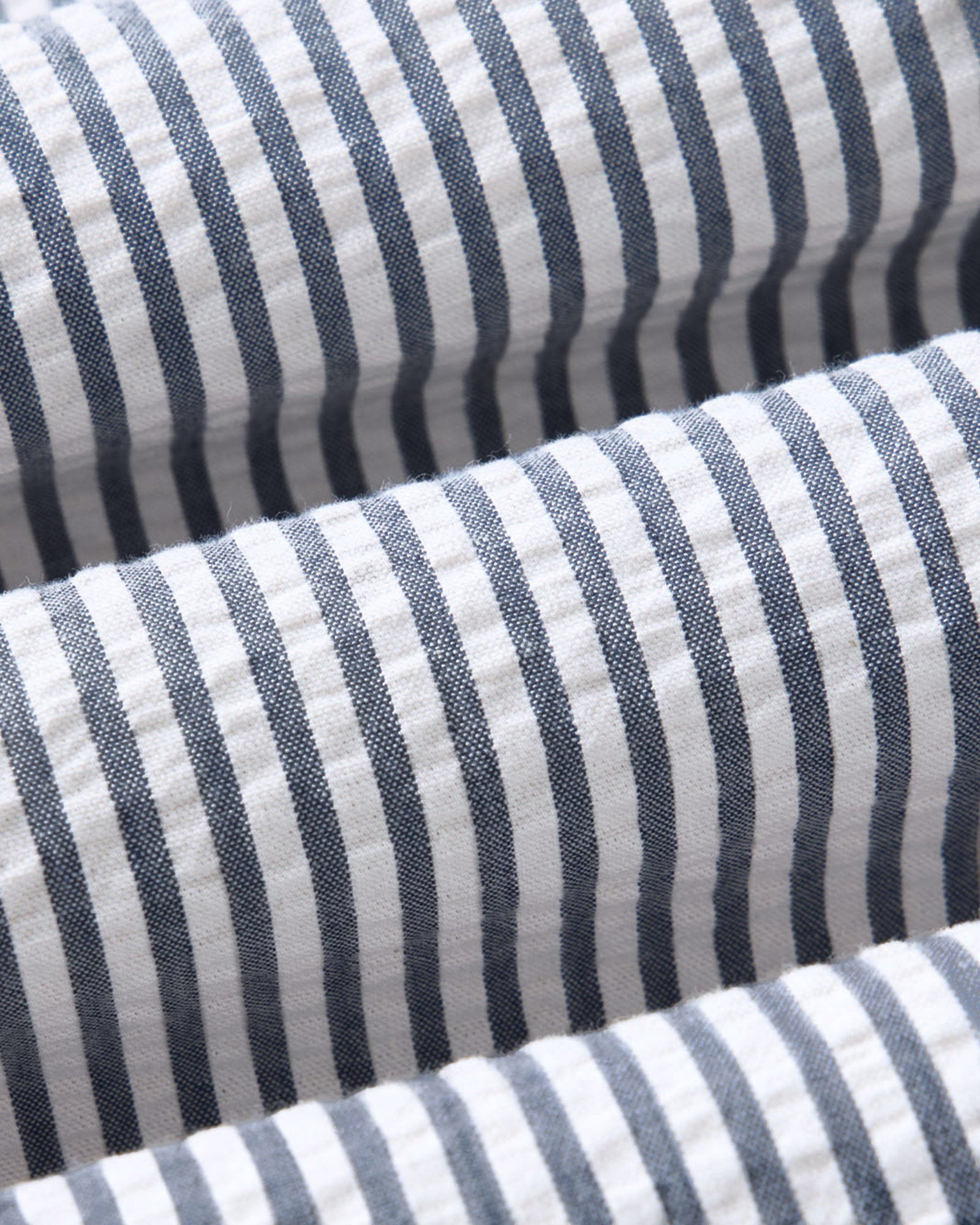 flatlay of The Short Sleeve Jack in Steel Blue Stripe Seersucker, Wovens by Taylor Stitch