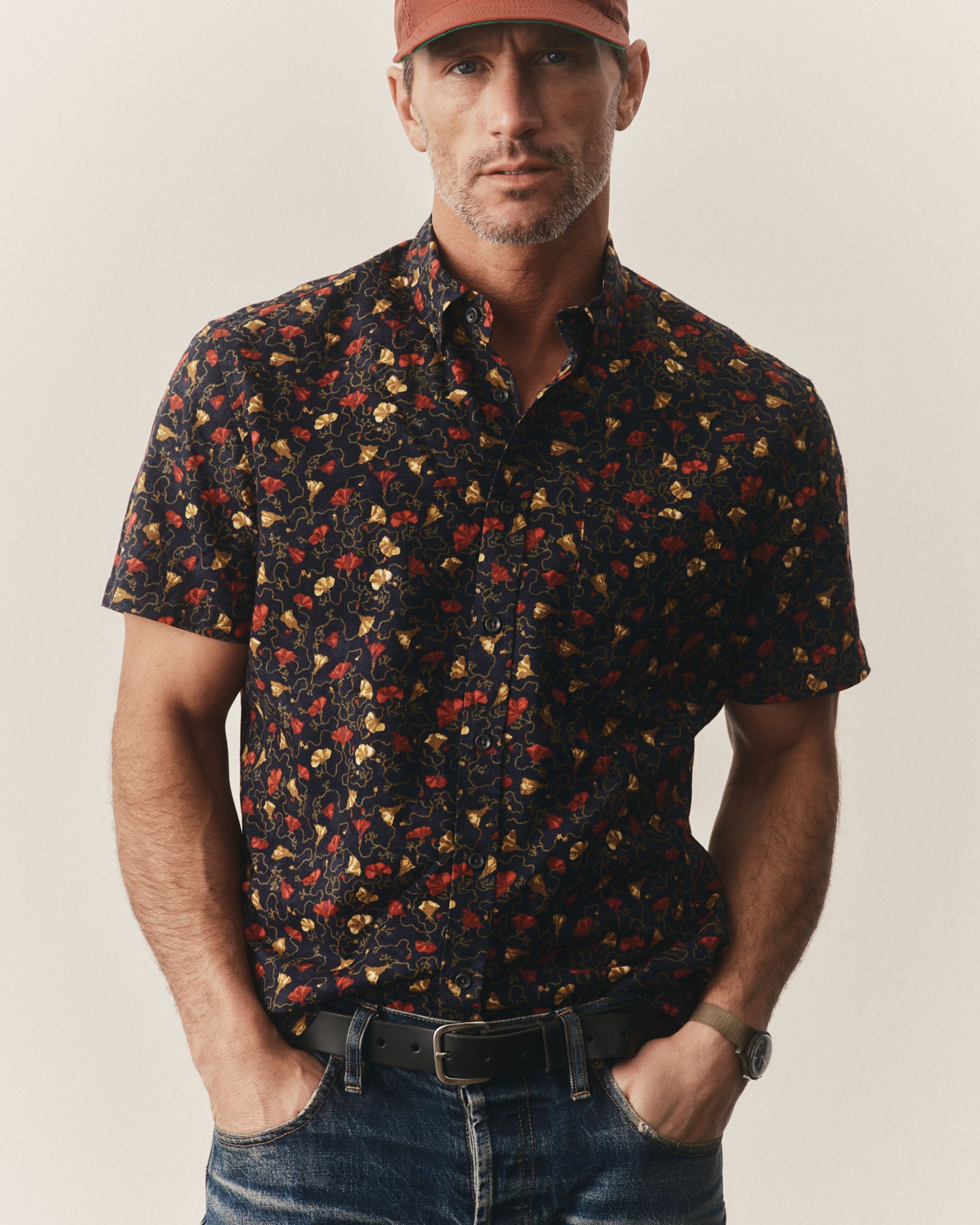 fit model posing in The Short Sleeve Jack in Vintage Bloom, Wovens by Taylor Stitch