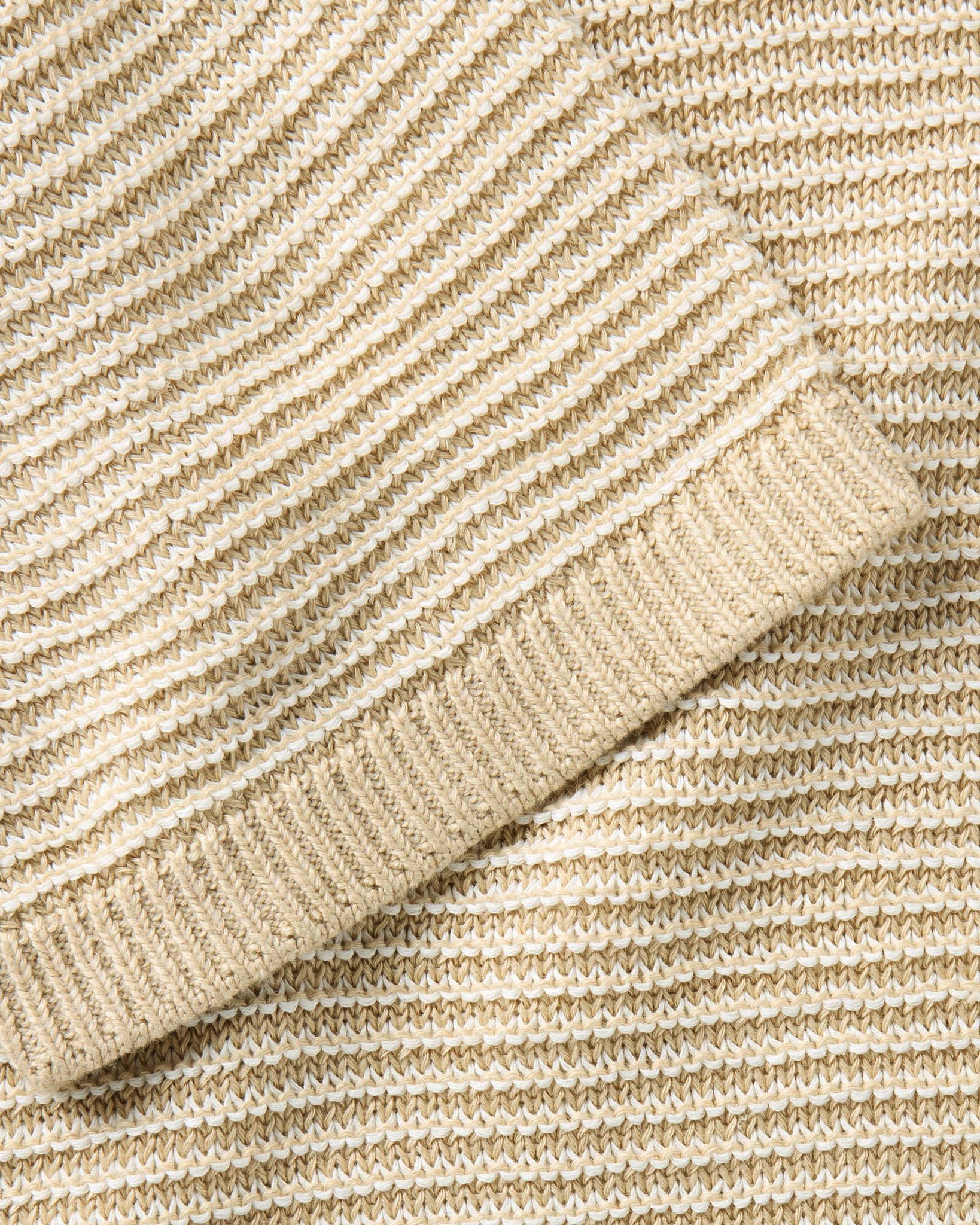 material shot of the sleeve on The Valencia Sweater Polo in Sand Stripe, Knits by Taylor Stitch
