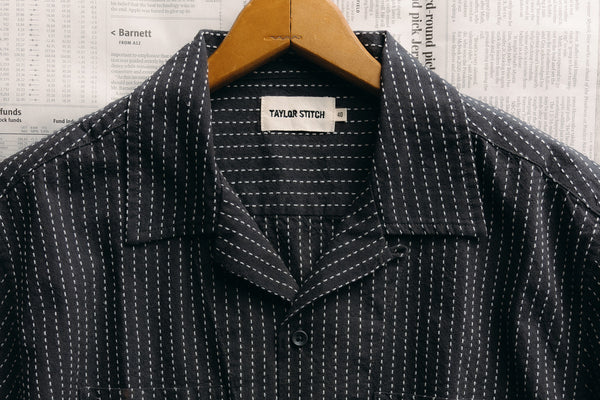 Model wearing The Conrad Camp Shirt in Fatigue Olive Dobby