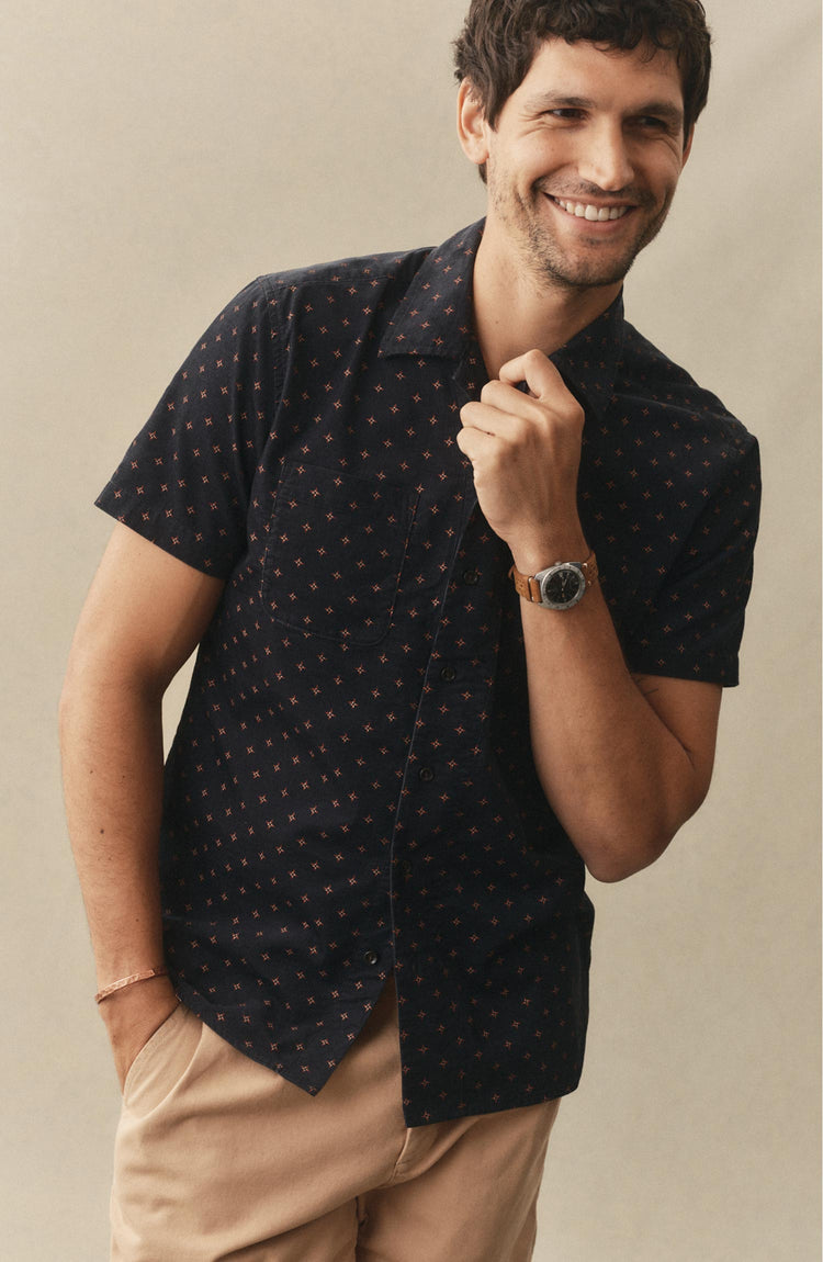fit model posing in The Conrad Shirt in Navy Pigeon Foulard Pincord