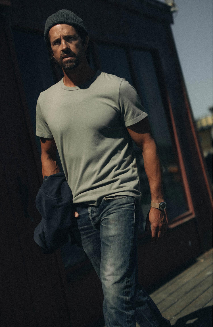 fit model posing in The Organic Cotton Tee in Sage