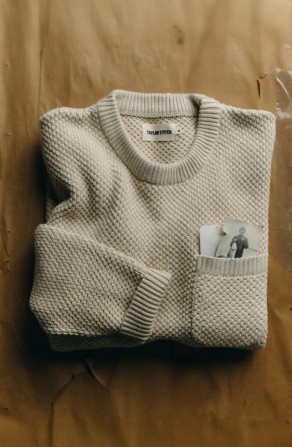 editorial flatlay of The Crawford Crew Sweater in Marled Natural