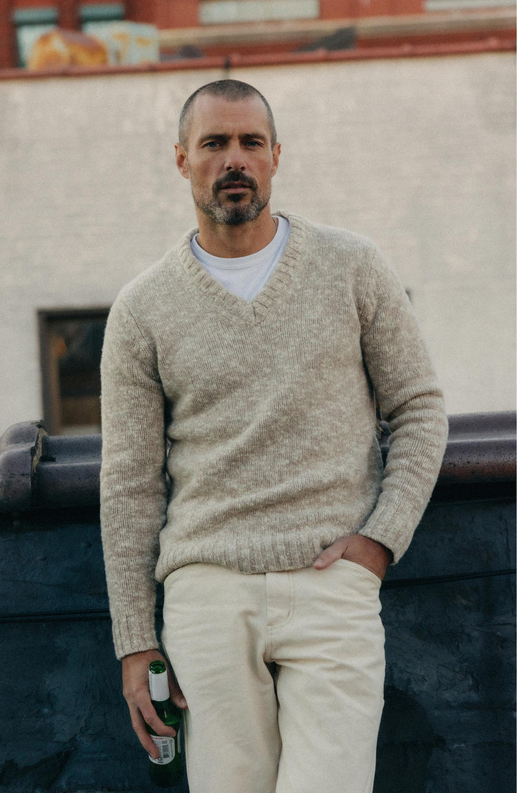 fit model posing in The Match V-Neck Sweater in Sable Merino Slub