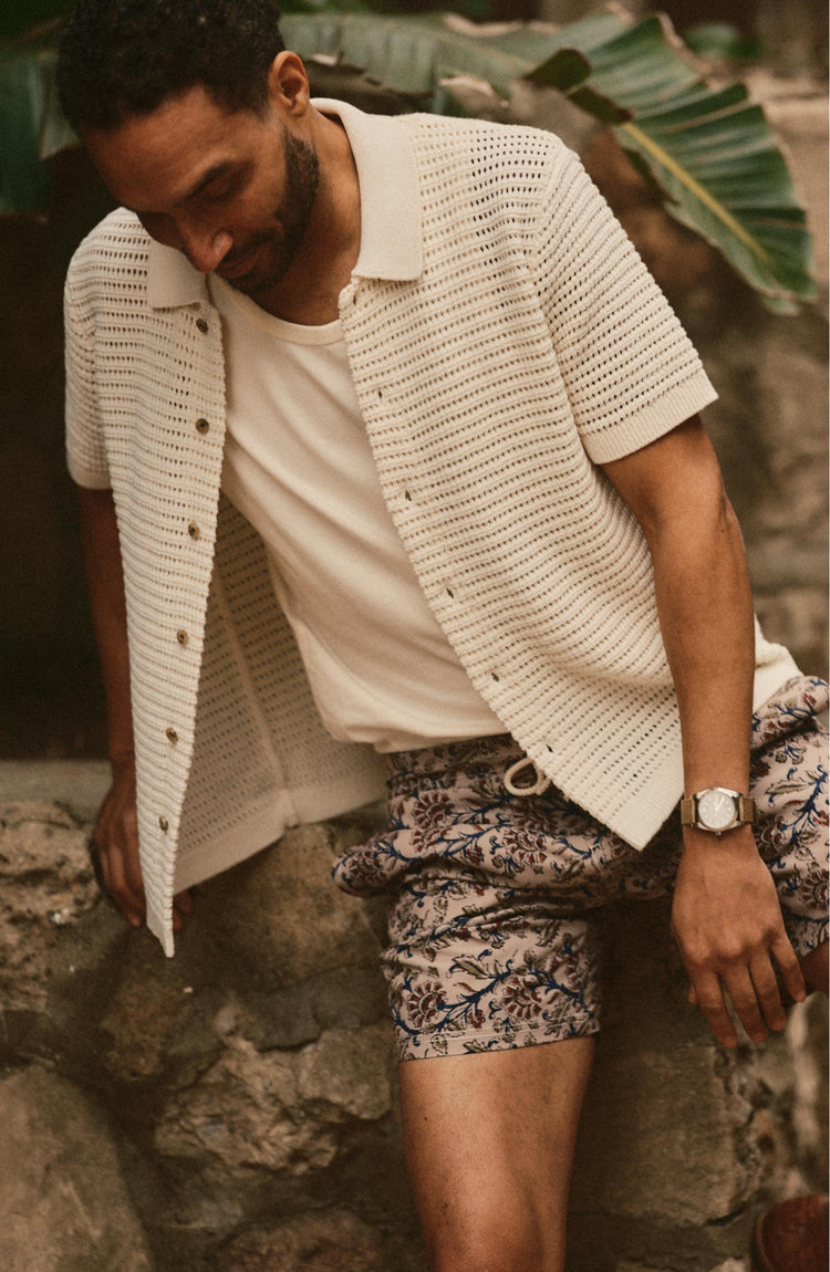 fit model posing in The Monterey Sweater Polo in Vintage White Crochet