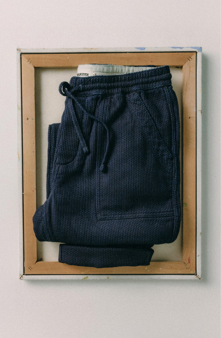 folded flatlay of The Breakwater Pant in Rinsed Indigo Sashiko