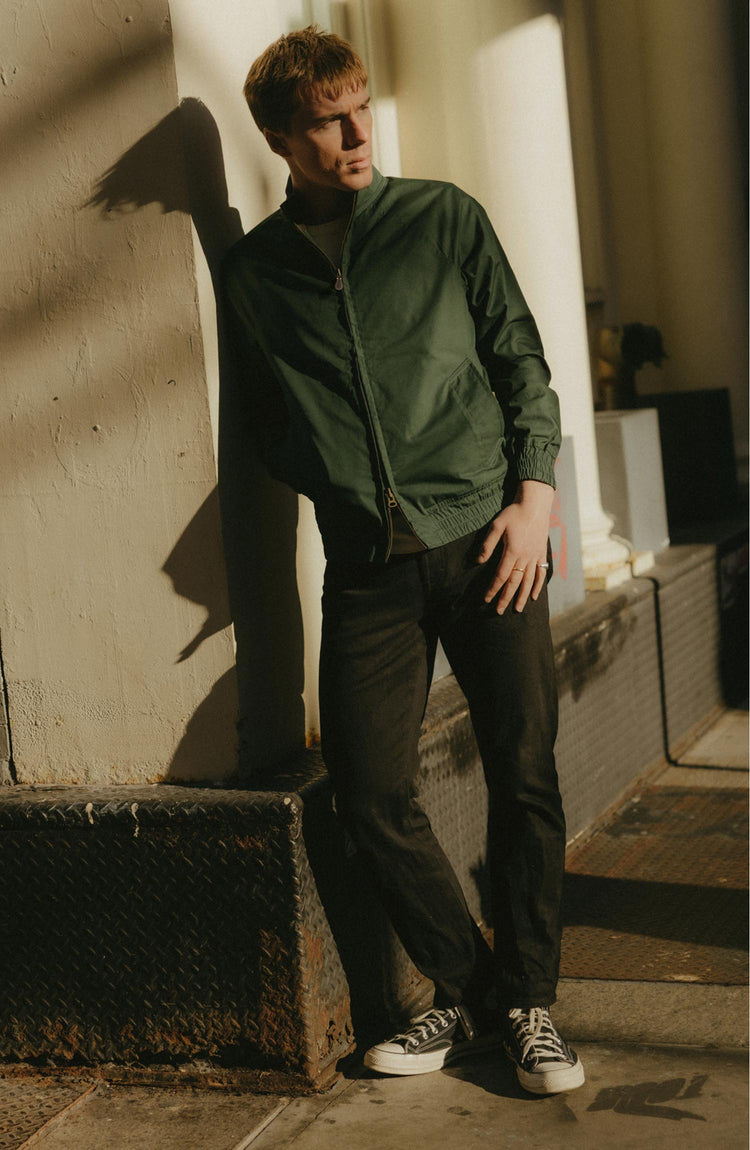 fit model posing in The Dean Jacket in Dark Spruce Twill