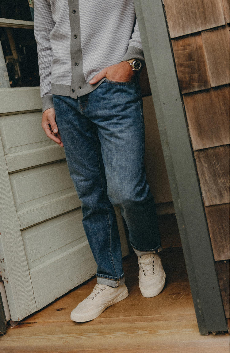 fit model posing in The Democratic Jean in Mid Wash Organic Selvedge