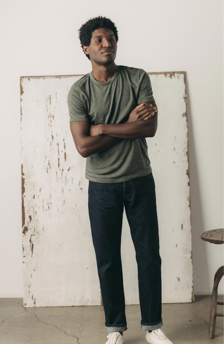 Model wearing The Merino Tee in Heather Army