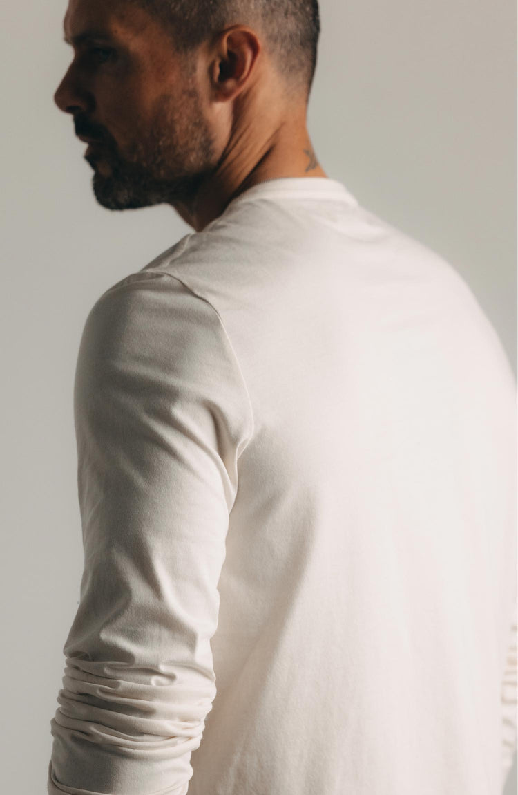editorial flatlay of The Organic Cotton Long Sleeve Tee in Vintage White
