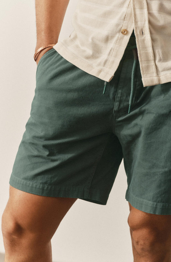 fit model showing off the back of The Apres Short in Organic Deep Sea Foundation Twill