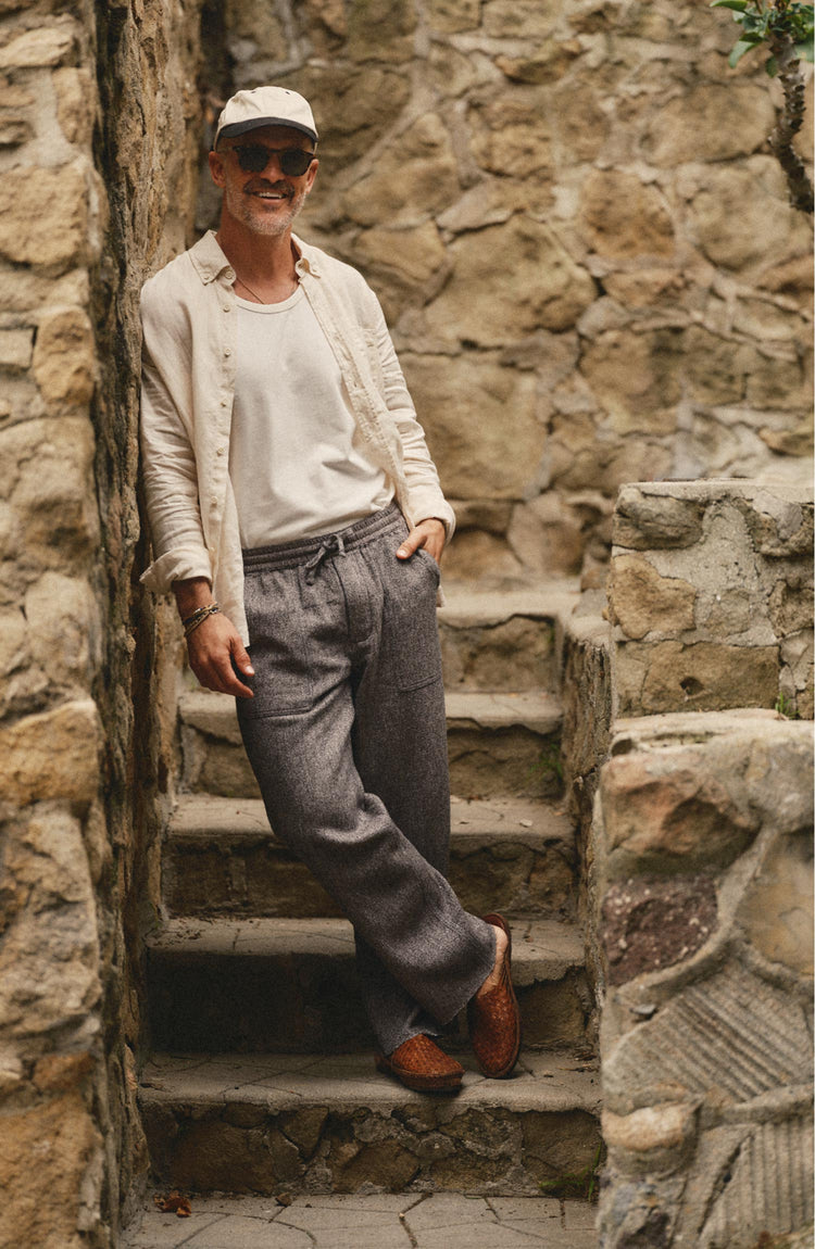 fit model posing in The Breakwater Pant in Grey Marl Hemp