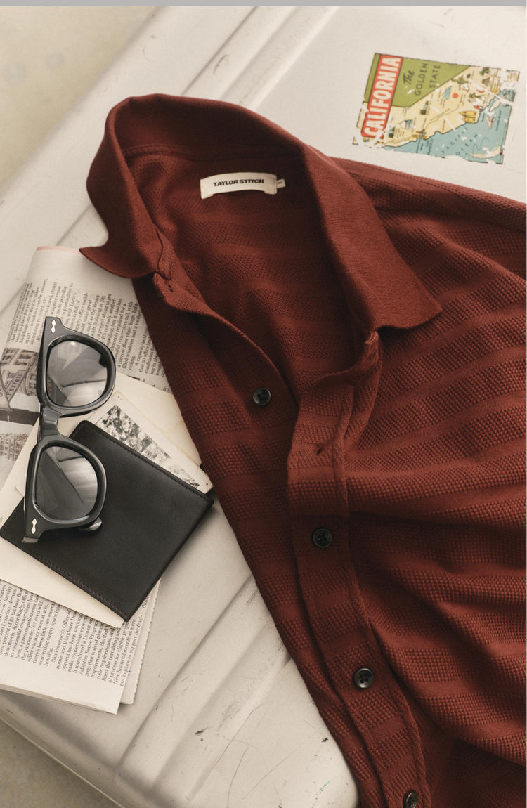 editorial image of The Bywater Polo in Burgundy Knit Stripe