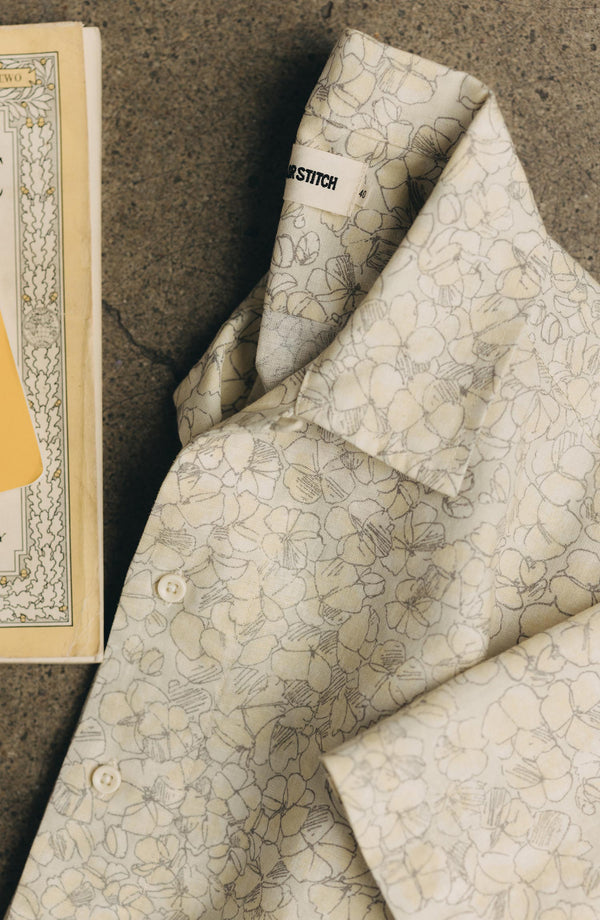 editorial flatlay of The Davis Shirt in Grey Skies Floral 