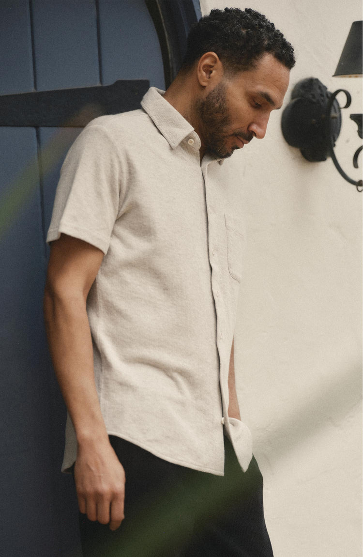 fit model posing in The Short Sleeve California in Heather Oat Double Knit