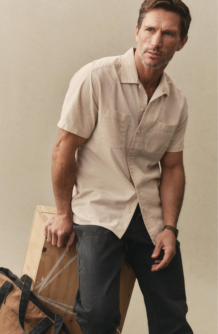 fit model posing in The Conrad Shirt in Heather Oat Pincord