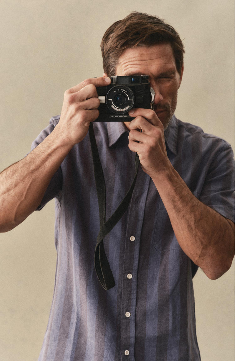 fit model posing in The Short Sleeve California in Blue Stone Stripe Hemp