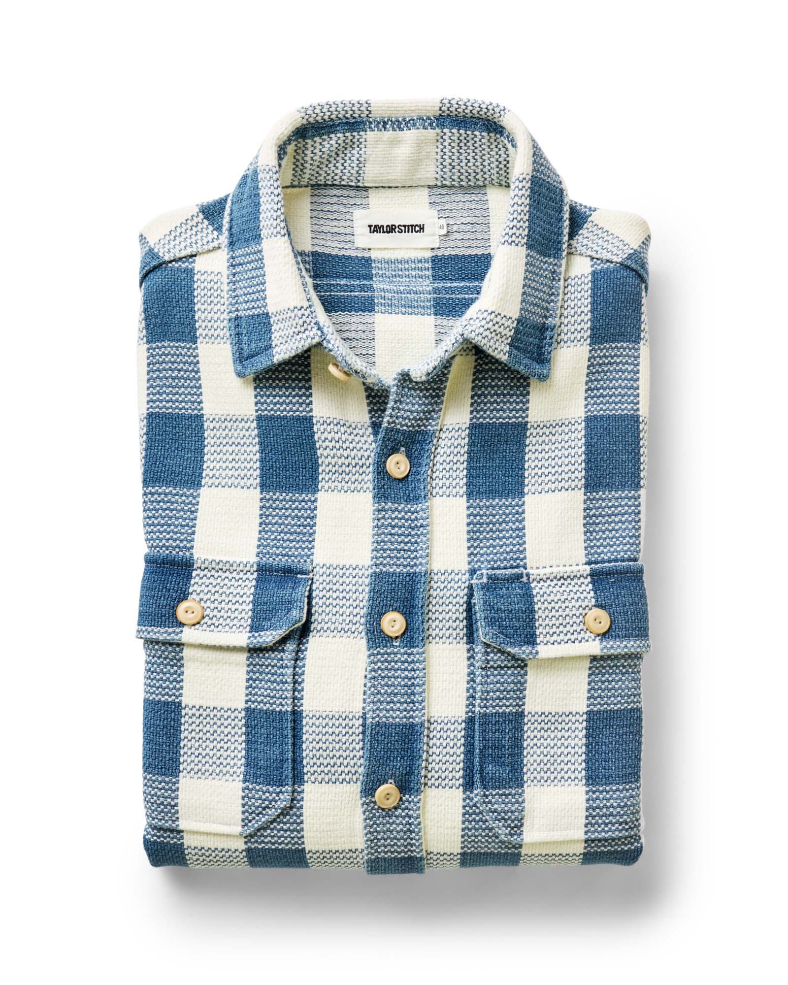 folded flatlay of The Division Shirt in Washed Indigo Check, Wovens by Taylor Stitch