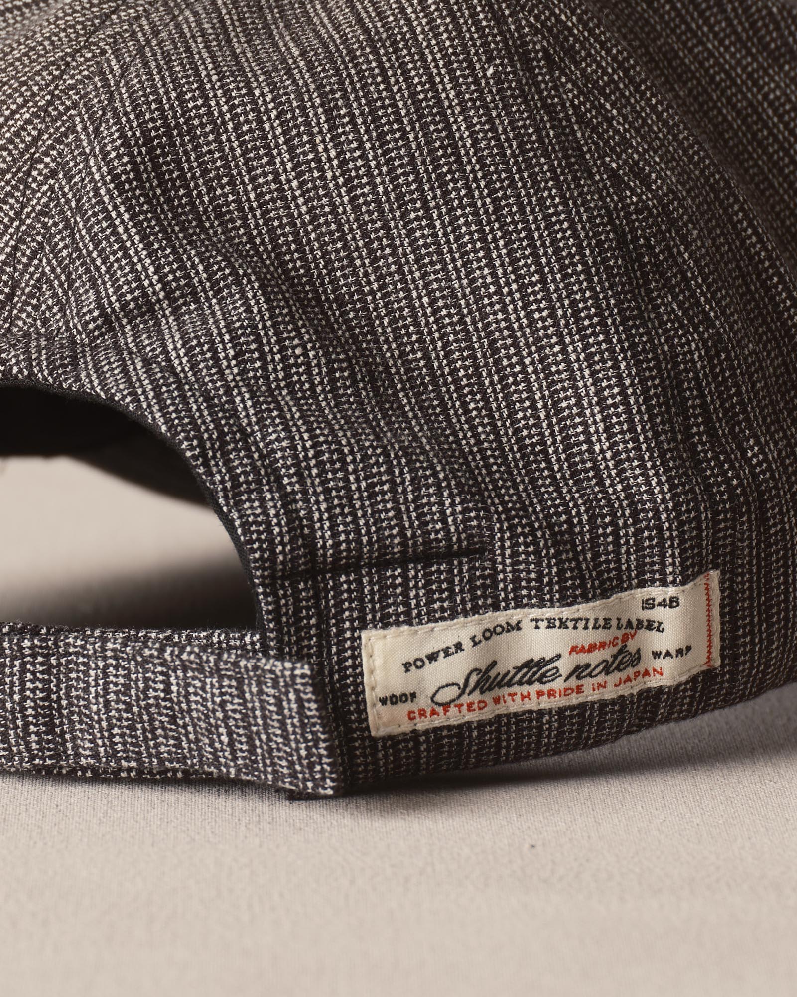 material shot of the back tag on The Taylor Stitch x Hypeadelic Cap v2.17