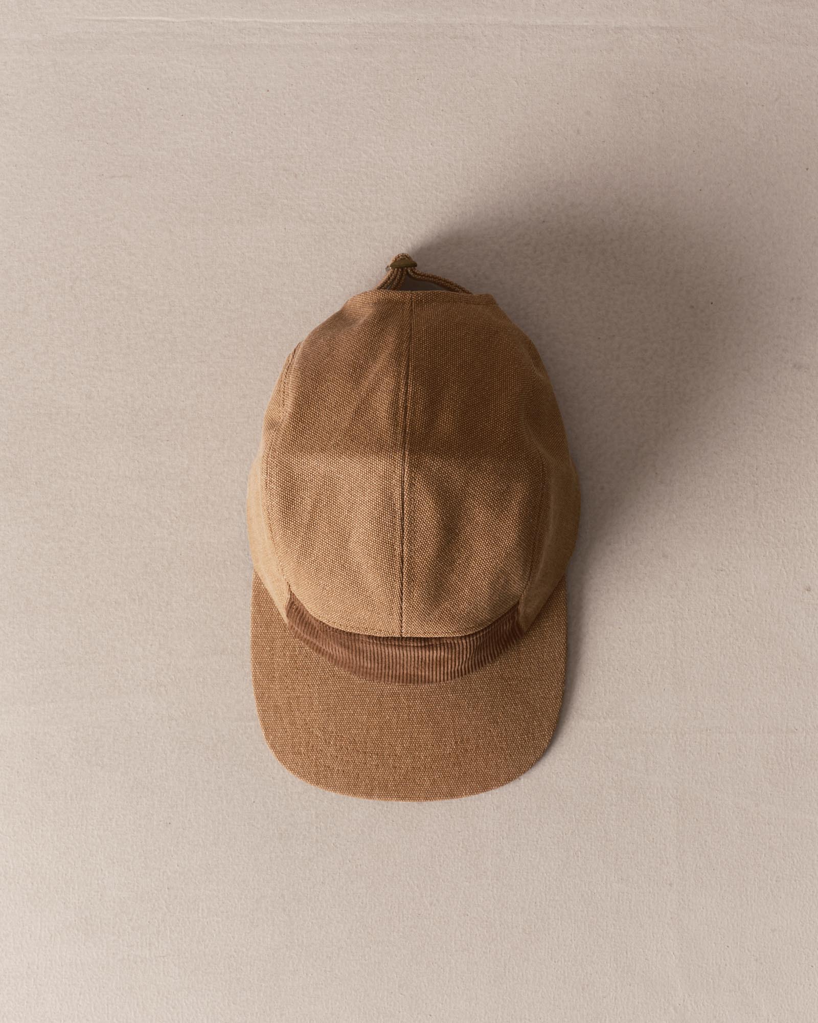 editorial image of The Taylor Stitch x Hypeadelic Cap v2.36 hanging