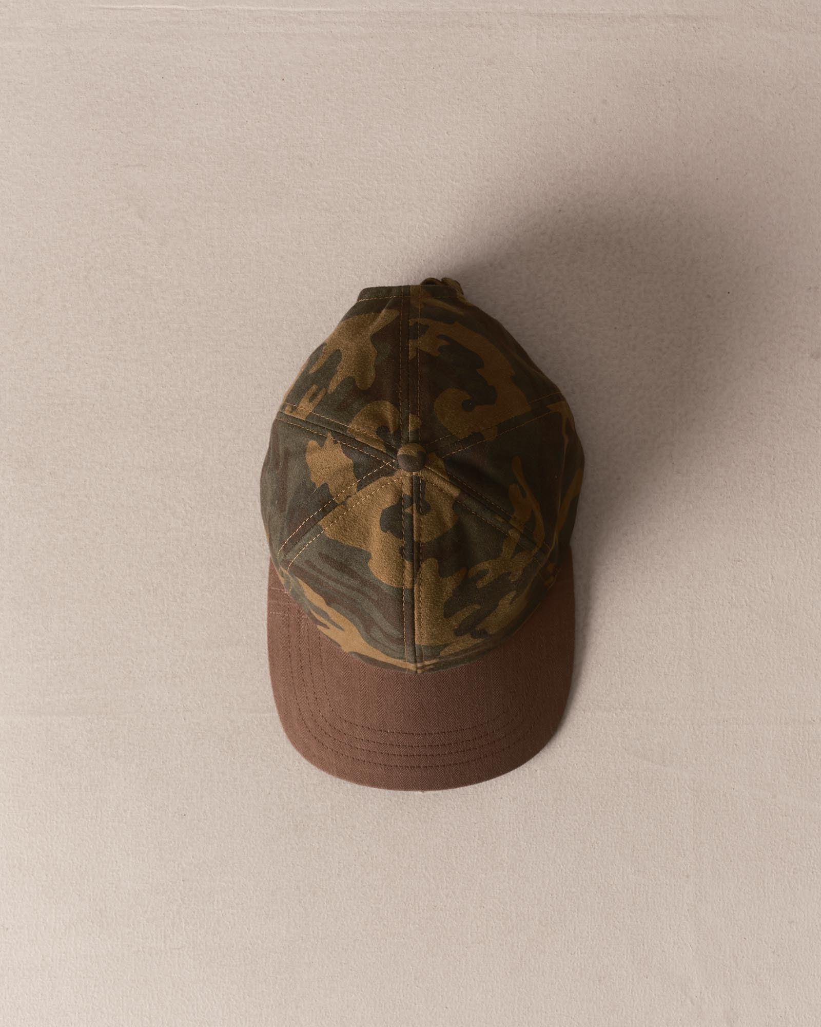 editorial image of The Taylor Stitch x Hypeadelic Cap v2.43 hanging