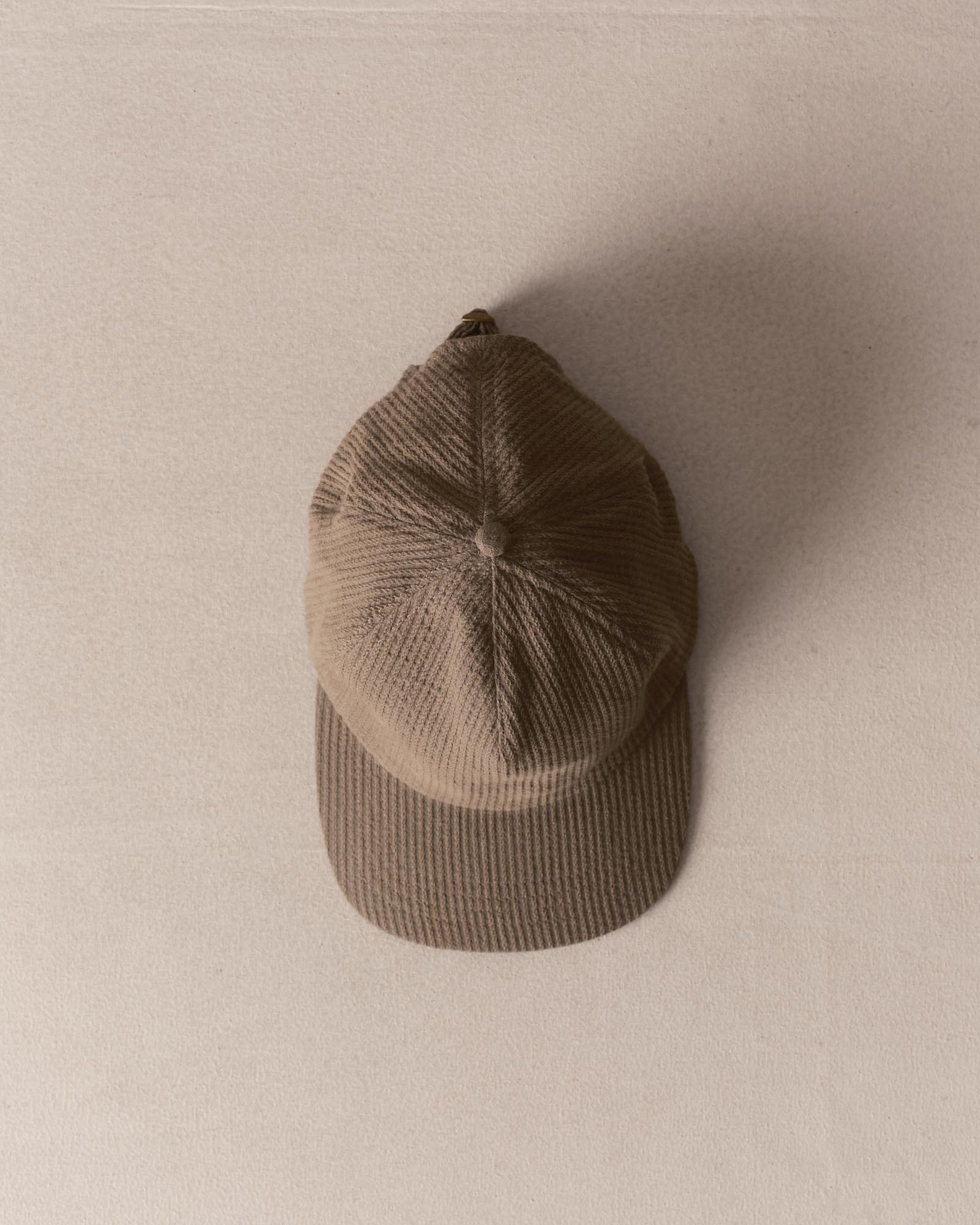 editorial image of The Taylor Stitch x Hypeadelic Cap v2.48 hanging