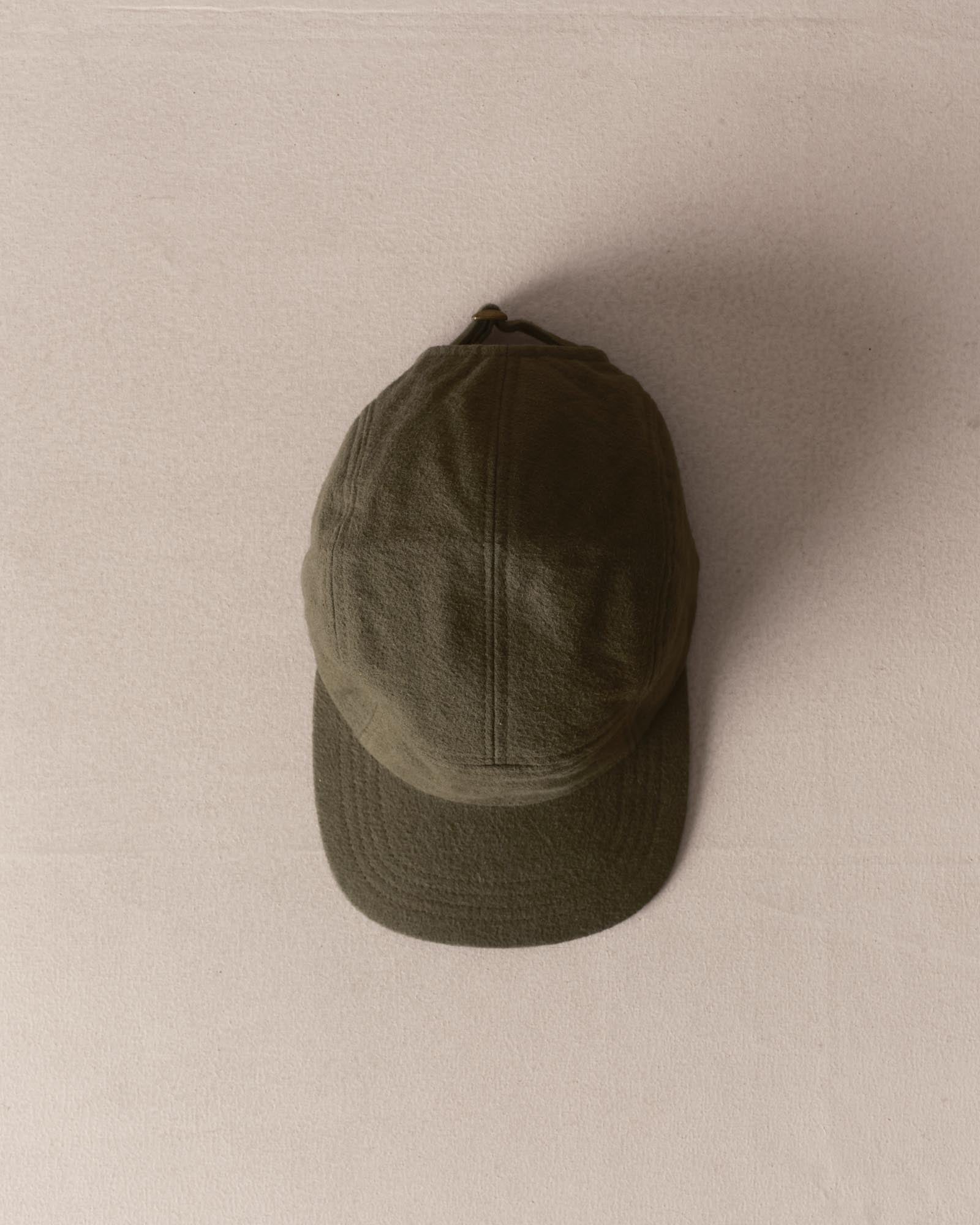 editorial image of The Taylor Stitch x Hypeadelic Cap v2.49 hanging