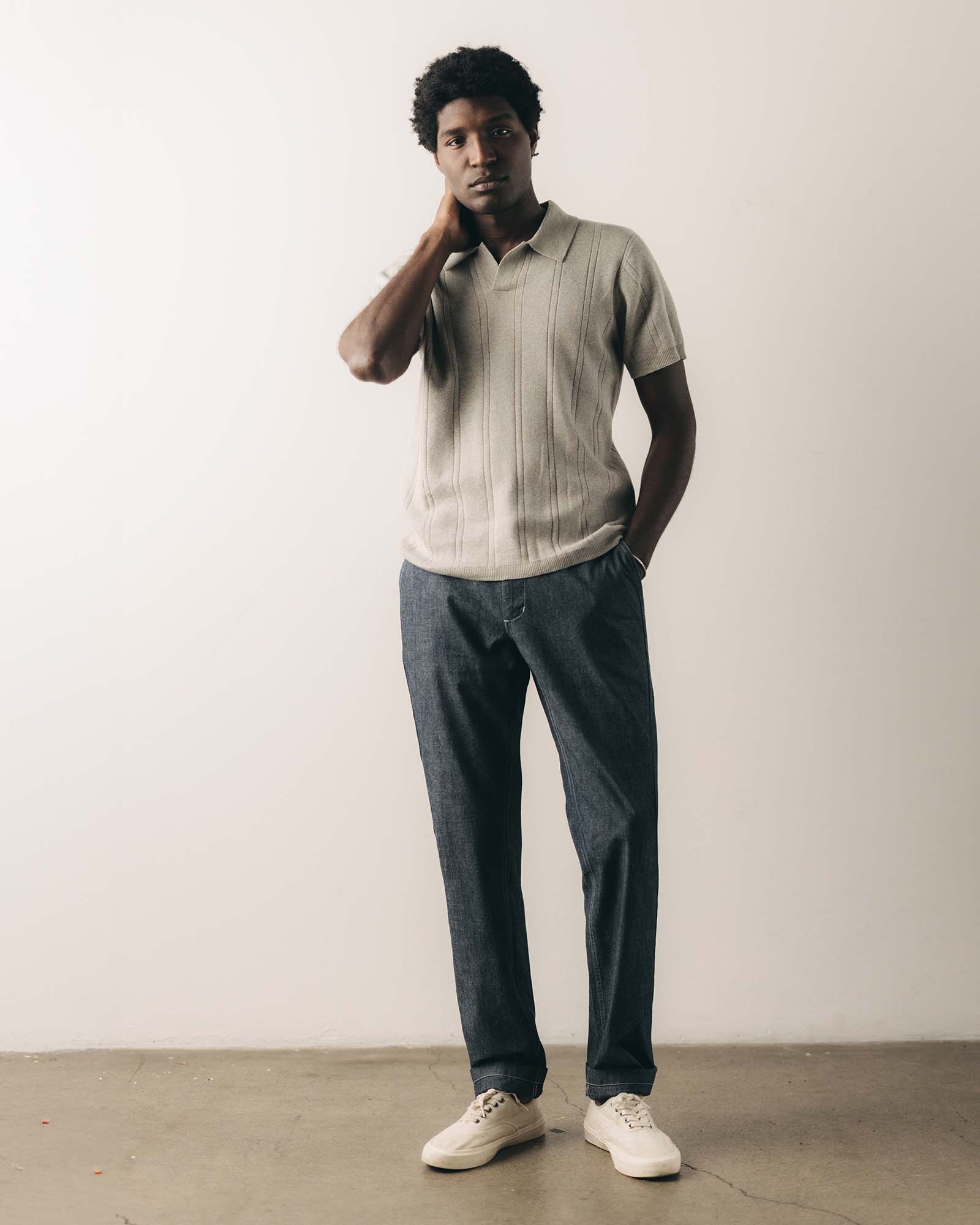 fit model showing off The Valencia Sweater Polo in Heather Grey Rib, Knits by Taylor Stitch