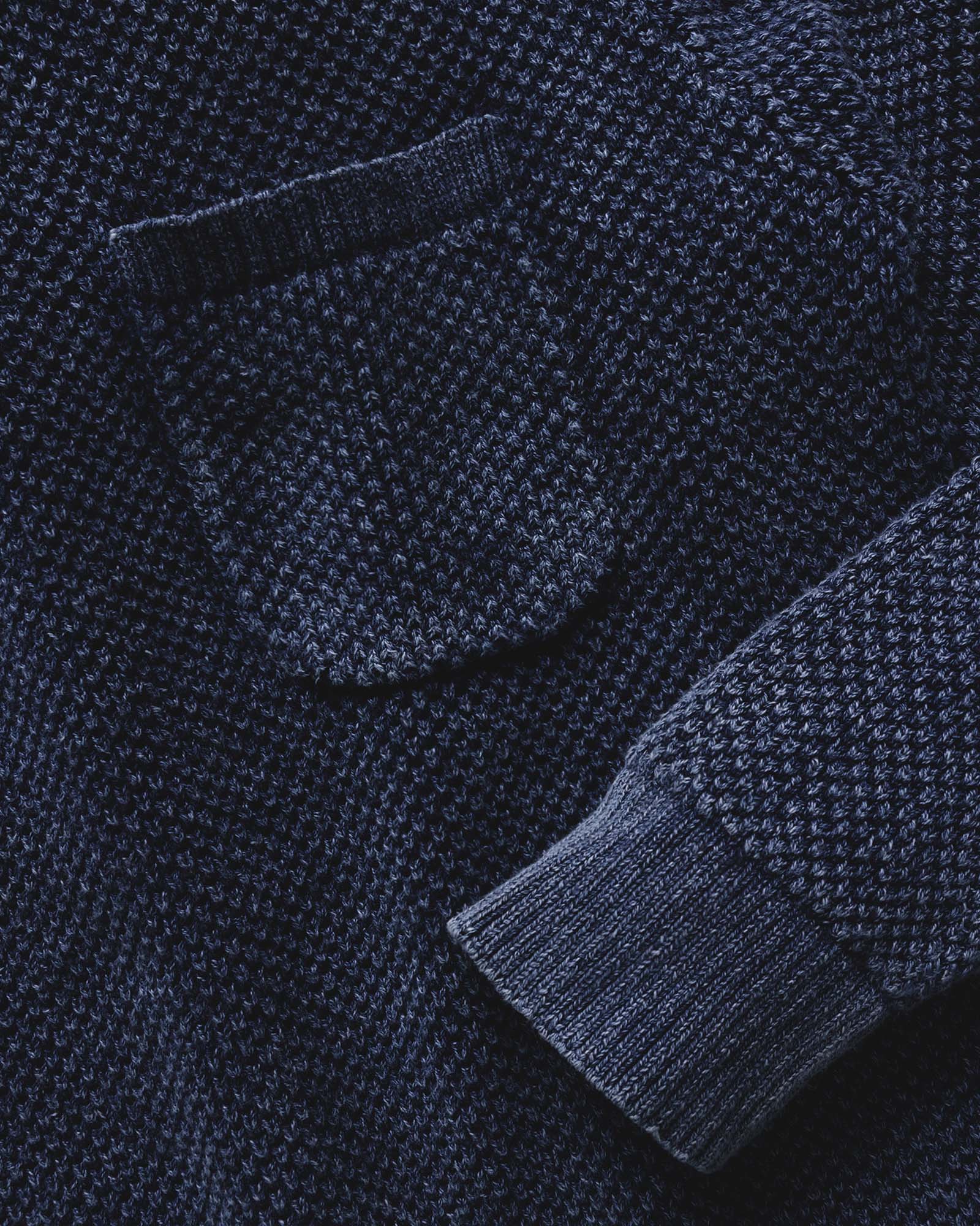 material shot of the pocket on The Crawford Crew Sweater in Washed Indigo, Knits by Taylor Stitch