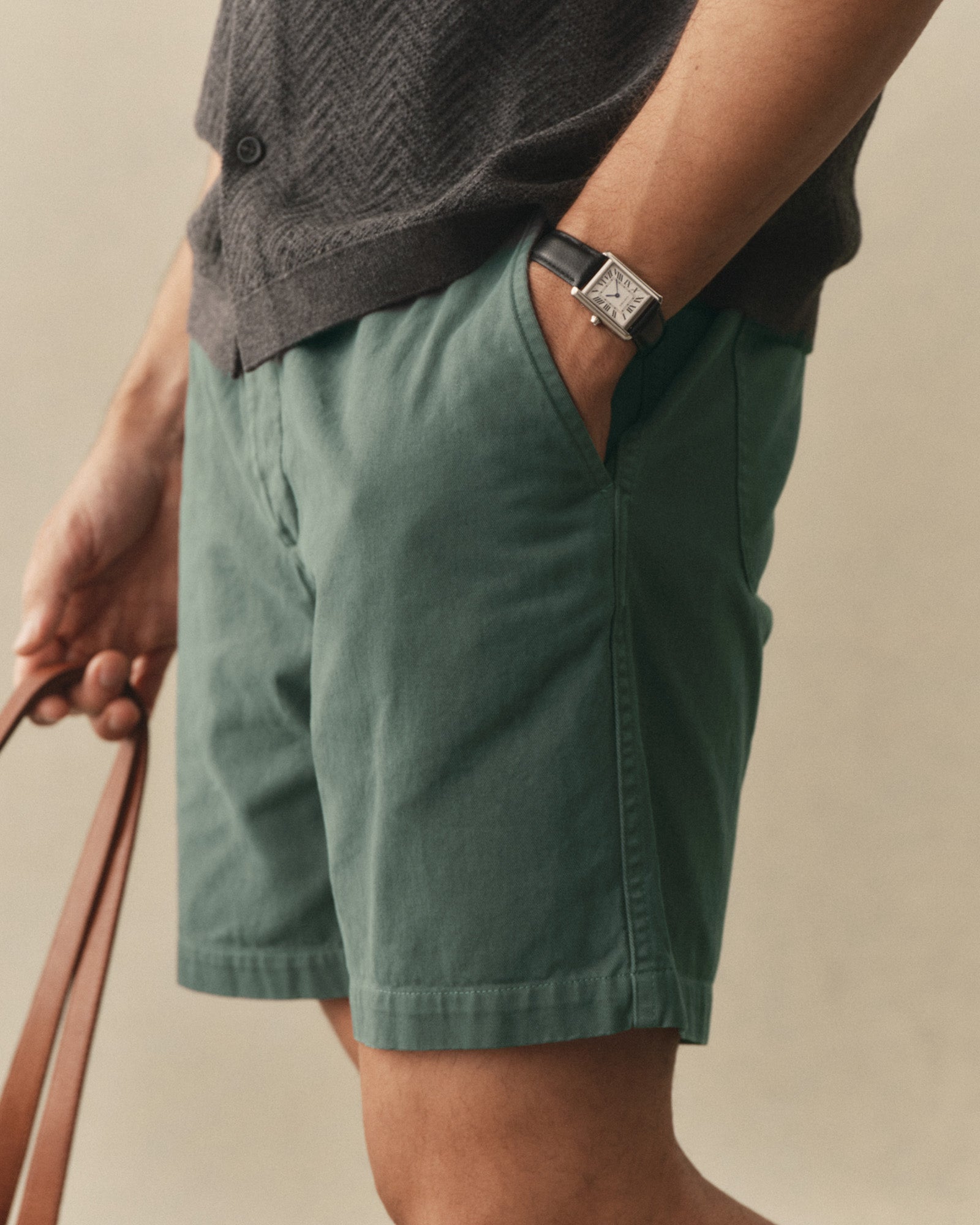 fit model showing off the side of The Apres Short in Organic Deep Sea Foundation Twill, Bottoms by Taylor Stitch
