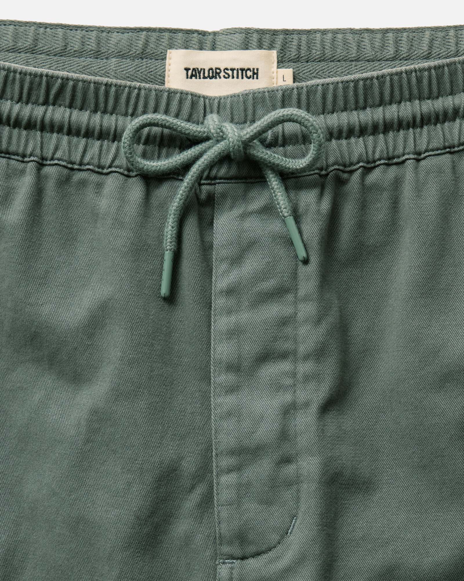 material shot of the waistband on The Apres Short in Organic Deep Sea Foundation Twill, Bottoms by Taylor Stitch