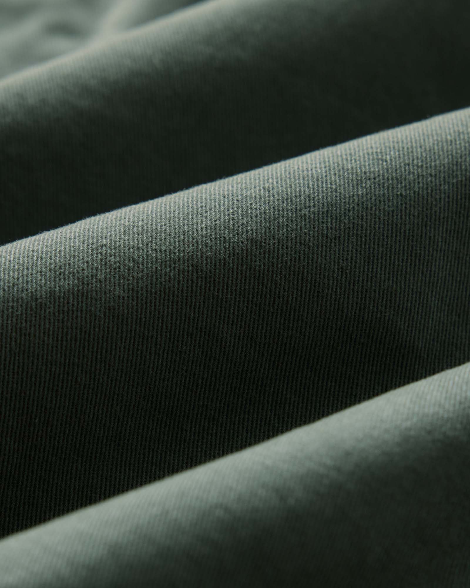 materia shot of the fabric on The Apres Short in Organic Deep Sea Foundation Twill, Bottoms by Taylor Stitch