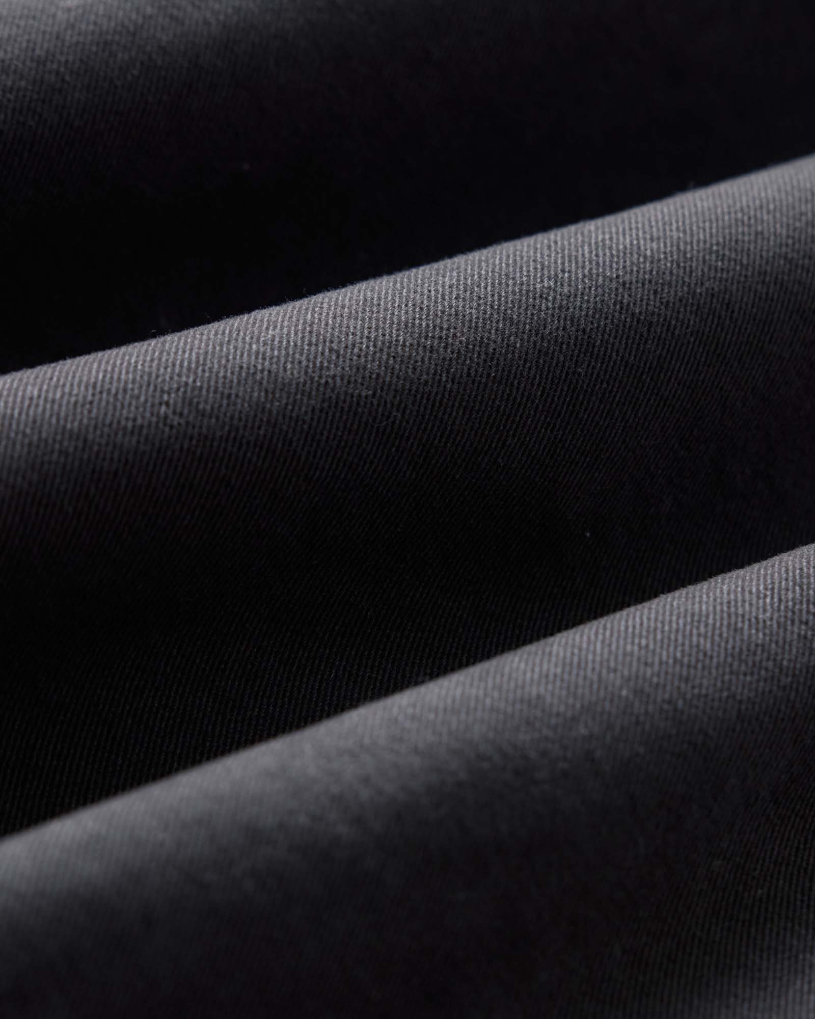 material shot of the fabric on The Apres Short in Organic Faded Black Foundation Twill, Bottoms by Taylor Stitch