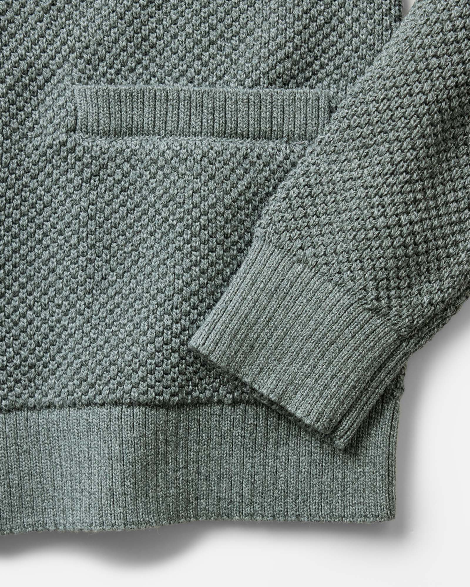 material shot of the sleeve on  The Crawford Sweater in Deep Sea Twist, Knits by Taylor Stitch